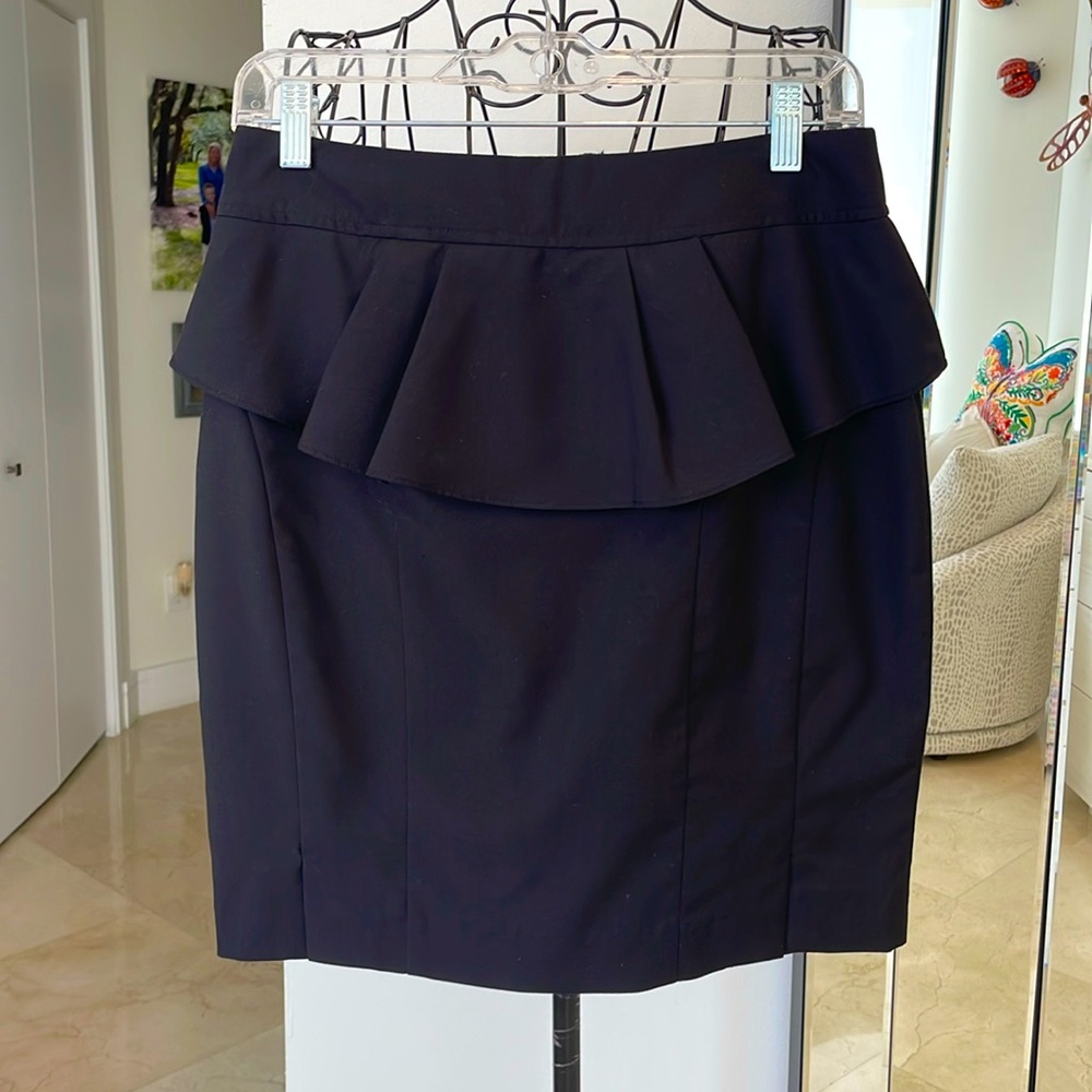 PRIORITIES BLACK PEPLUM MINI SKIRT